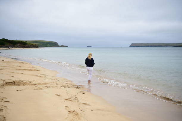 istock Senior Woman on a Beach 1006322398