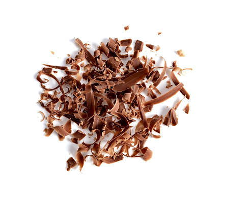 grated chocolate on white background