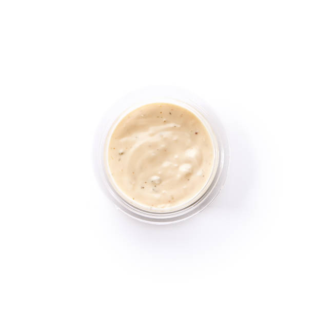 istock White Dip Sauce Tzatziki, Aioli or Bechamel with Herbs 1006373472