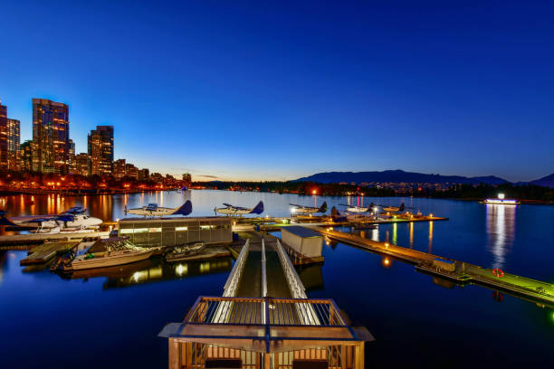 istock Vancouver skyline with harbor at sunset 1006383846