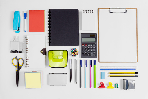 Multiple stationery items for office and school. Top view flat lay of office supply with copy space.