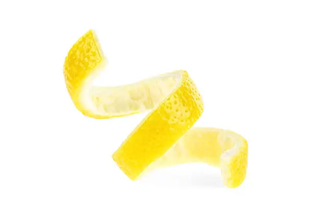 Photo of Lemon peel isolated on a white background. Healthy food.