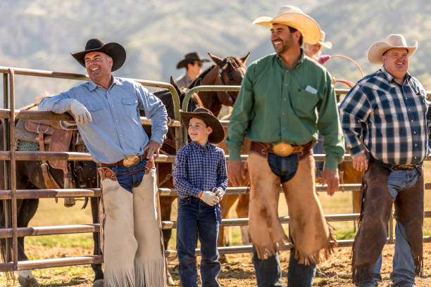 istock Learning the Ropes: Young Cowboy Learns Farm Life on Ranch 1006398762