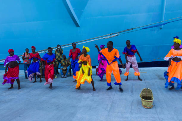 LABADEE, HAITI - MAY 01, 2018: local music group singing and greeting tourists from cruise ship docked in Labadee, Haiti on May 1 2018 LABADEE, HAITI - MAY 01, 2018: local music group singing and greeting tourists from docked in Labadee, Haiti on May 1 2018. citadel haiti photos stock pictures, royalty-free photos & images