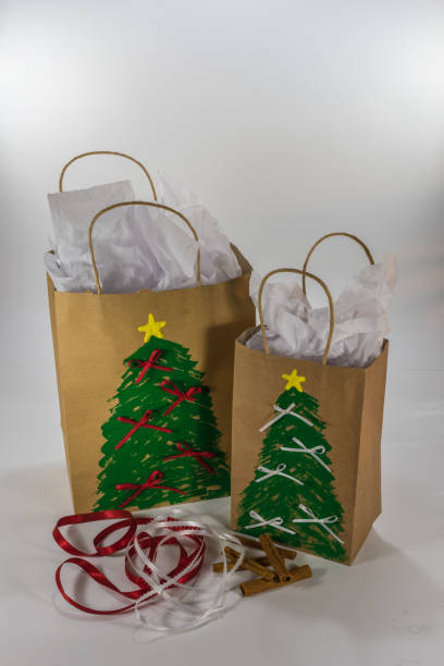 istock Paper gift bags with a Christmas design painted on it 1006423794