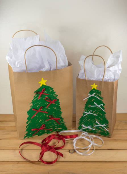 istock Gift bags painted with a Christmas design 1006423818