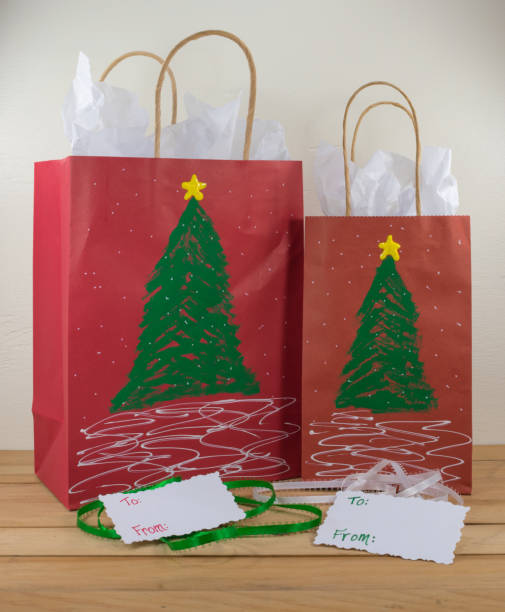 istock Gift bags painted with a Christmas design 1006423844