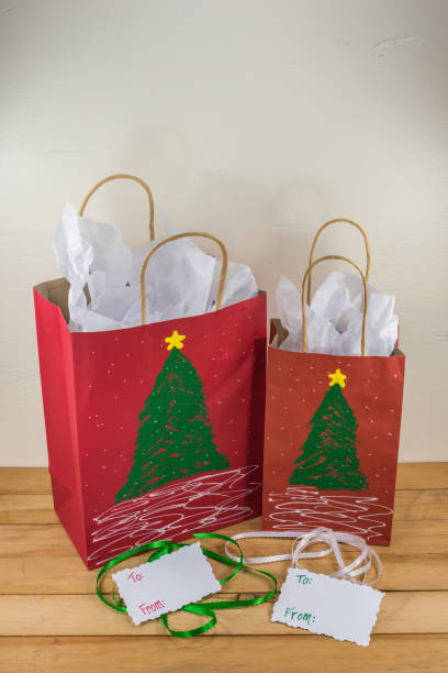 istock Gift bags painted with a Christmas design 1006423846