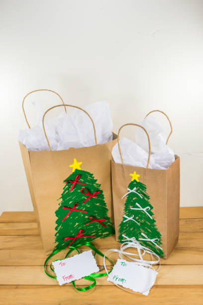 istock Gift bags painted with a Christmas design 1006423868