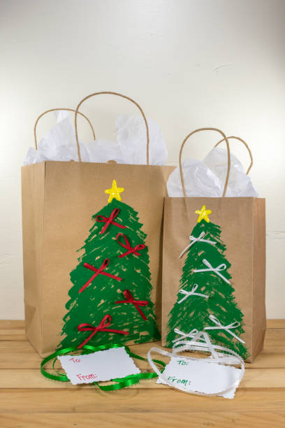 istock Gift bags painted with a Christmas design 1006423870