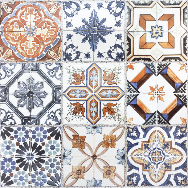 istock Beautiful old wall ceramic tiles patterns handcraft from thailand public. 1006430166