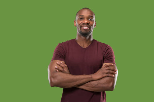 istock The happy business man standing and smiling 1006446280