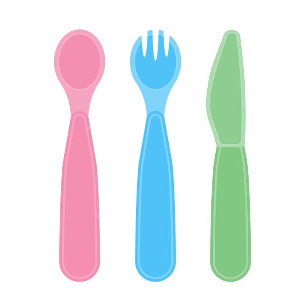 Child utensils isolated on white Vector illustration of kid spoon, fork and knife isolated on white background. Toddler plastic utensils in bright colors. Baby feeding supplies. baby spoon stock illustrations
