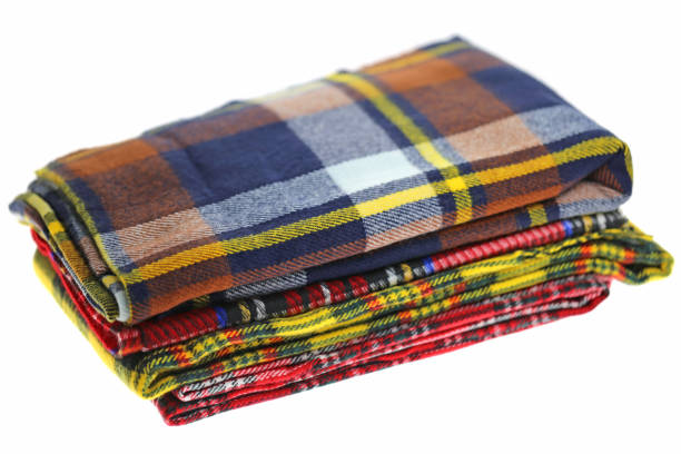 istock Scarf. checkered autumn scarves pile isolated on white background. 1006463220
