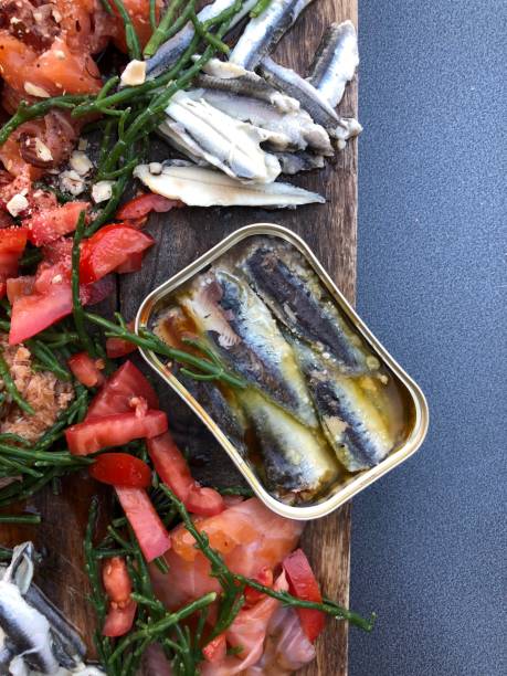 istock Seafood tapas snack sharing plank salmon anchovy tuna crab 1006468910
