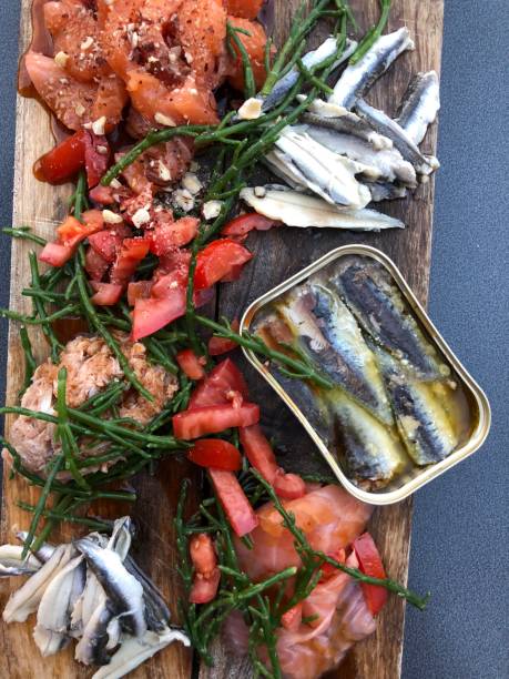 Seafood tapas snack sharing plank salmon anchovy tuna crab