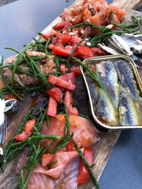 istock Seafood tapas snack sharing plank salmon anchovy tuna crab 1006468986