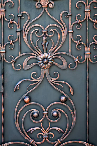 istock beautiful decorative metal elements forged wrought iron gates 1006469146