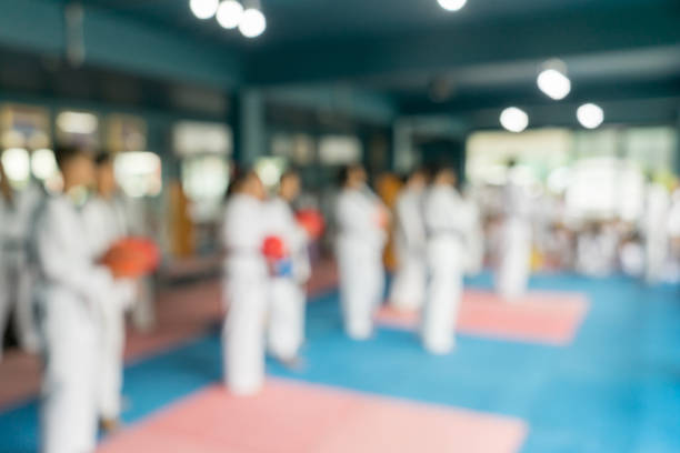 istock Blur abstract background of kids learning in taekwondo class 1006481070