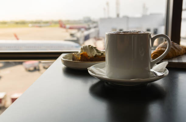 istock Hot coffee with breakfast at airport lounge. 1006484780