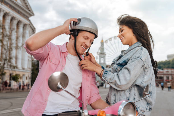 istock Happy optimistic woman helping man 1006489758