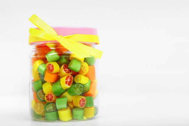 istock Caramel lollipops in a jar 1006499660