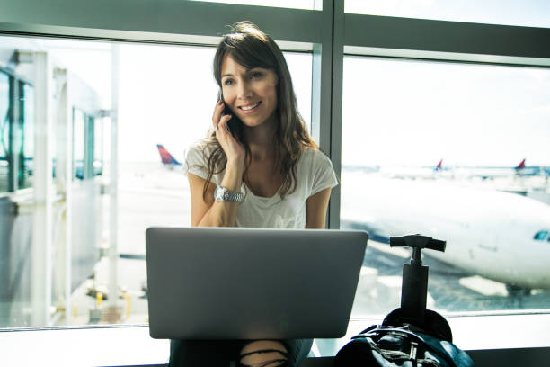 istock Woman at the airport 1006499832