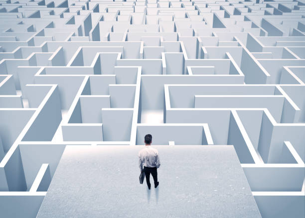 istock Businessman staring at infinite maze 1006500020