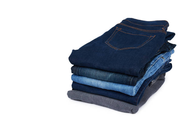 istock Foldet jeans in pile, isolated on white background. copy space template 1006500160