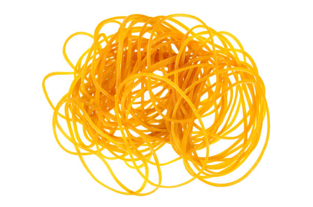 istock Yellow rubber bands close up isolated on white background. 1006500200