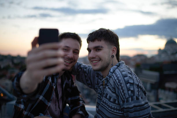 istock Gay couple outdoors 1006500396
