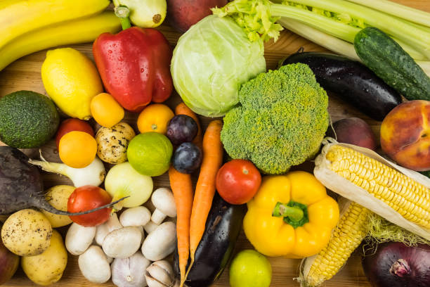 istock Close-up top view image of fresh organic vegetables and fruit 1006503396