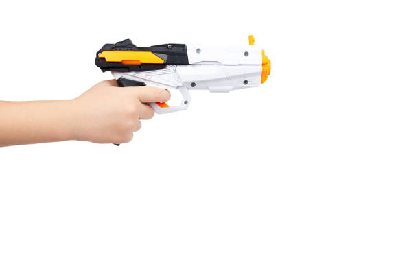 istock Futuristic toy gun with kid hand, isolated on white background. copy space template 1006503586