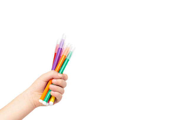 istock Kid hand hold color felt pen with hand, isolated on white background. copy space template 1006503634