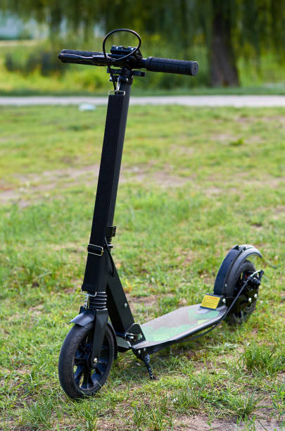istock Black folding kick scooter, close up parts 1006504240