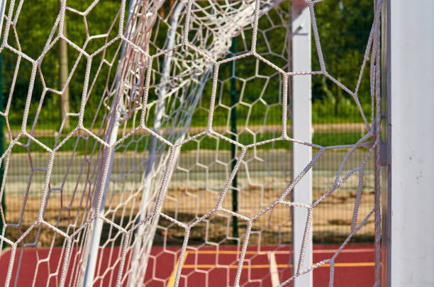 istock Soccer gates net close up in the public playground 1006504678