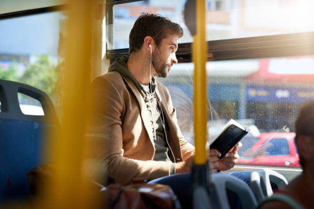 istock The bus is a great place to catch up on some reading 1006518804
