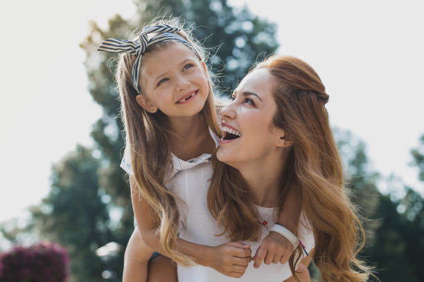 istock Beautiful blonde-haired mother spending weekend with her girl 1006522210