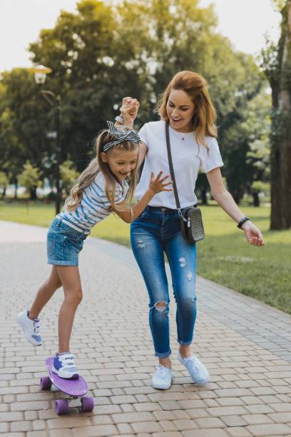 istock Blonde-haired daughter leading active lifestyle 1006528104