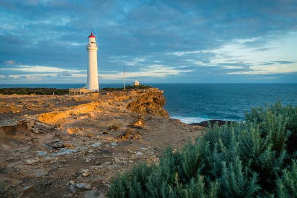 Cape Nelson state park at sunset, view of the lighthouse in australia stock photo
