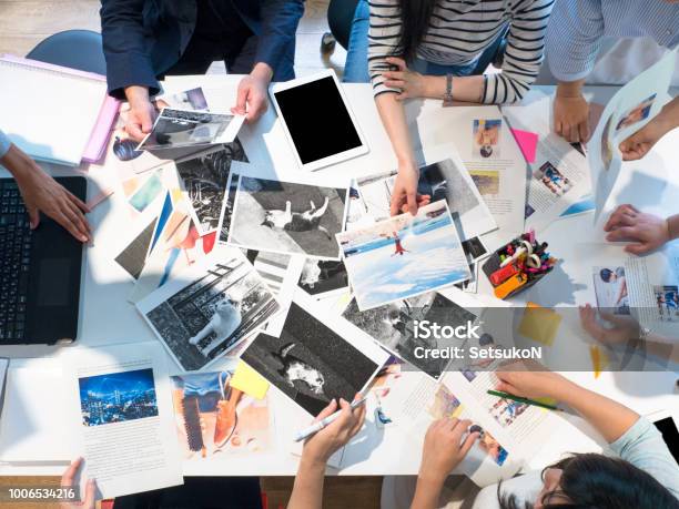 Magazine Editors At Work Stock Photo - Download Image Now - Creativity, Business Meeting, Magazine - Publication