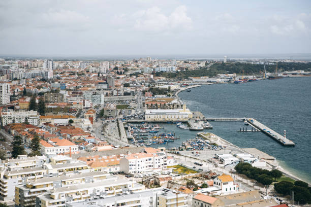 Beautiful panoramic view from above to the port city of Setubal in Portugal located on the Atlantic coast Beautiful panoramic view from above to the port city of Setubal in Portugal located on the Atlantic coast. setúbal city portugal stock pictures, royalty-free photos & images