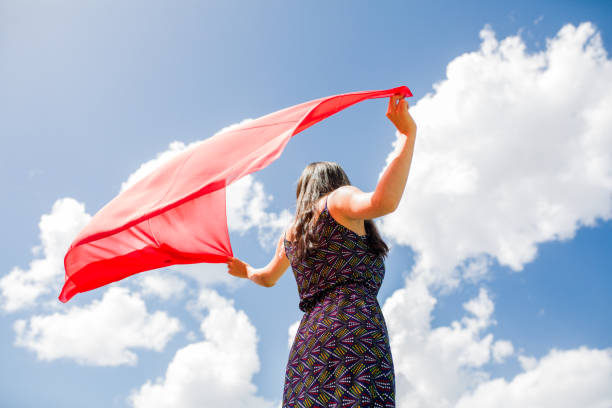 istock a young woman in the spring 1006545774