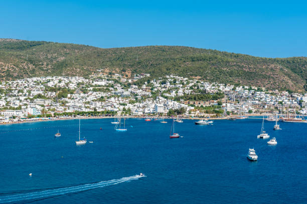 View of Mosque minaret Aerial view of Bodrum harbor Aerial view of Bodrum Marine with yachts from top of St. Peter Castle or Bodrum Castle in Turkey.Great blue sea view from the top of Bodrum Castle escort bodrum stock pictures, royalty-free photos & images