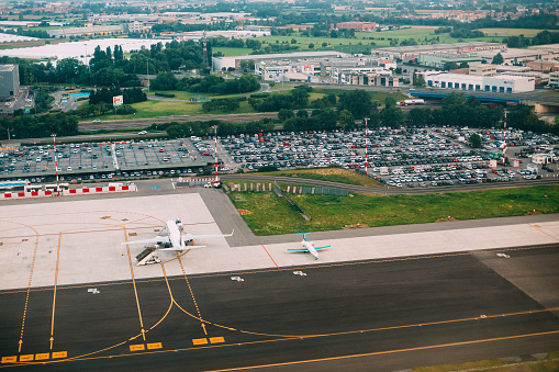 Bergamo, Italy - July 01, 2015: Aerial View Of Runway Of Orio Al Serio International Airport. Il Caravaggio International Airport, Is An International Airport Located In 3.7 Km Southeast Of Bergamo