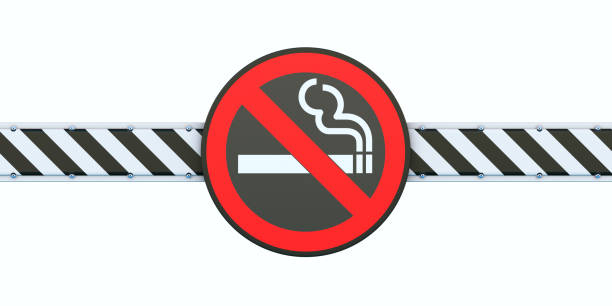 Red no smoking sign & striped security barrier isolated on white