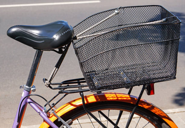 istock Part of a bicycle with shopping basket 1006560130