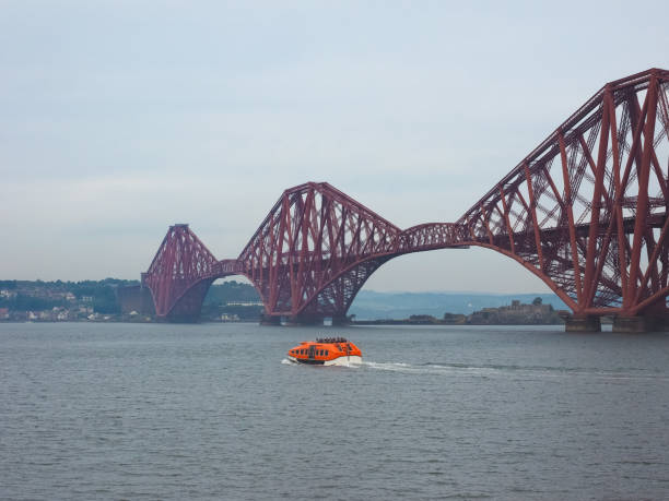 istock Forth Bridge over Firth of Forth in Edinburgh 1006563296