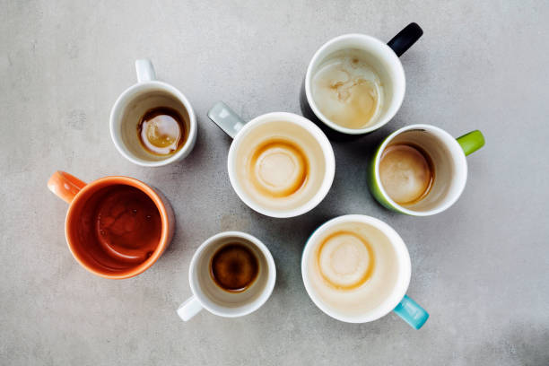 istock Many empty cups of coffee top view 1006581568