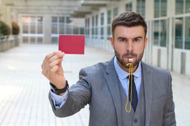 empresario con silbato y roja tarjeta - suit soccer men sport fotografías e imágenes de stock